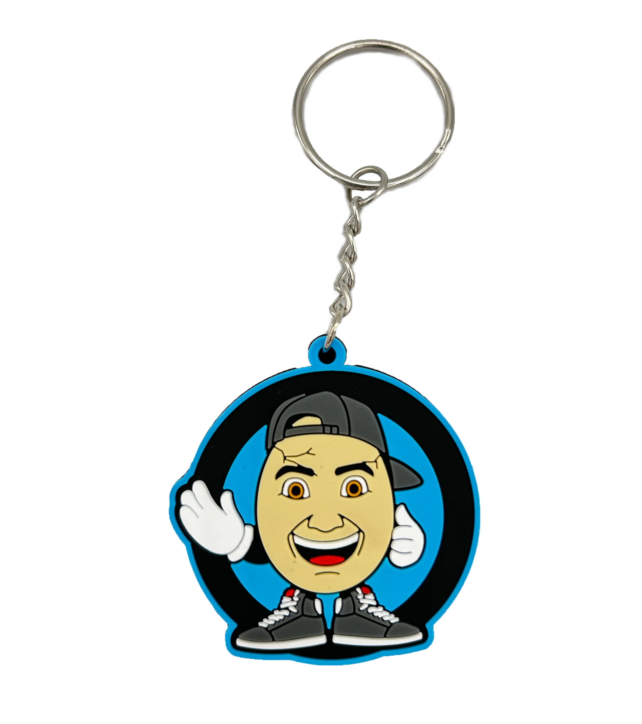 Schlüsselanhänger mit ClashGames Cartoon-Logo – rundes Design mit lächelnder Figur, Basecap und Sneakers. Der Anhänger ist aus flexiblem Gummi gefertigt und ideal für Rucksack, Schlüsselbund oder als Fanartikel.
